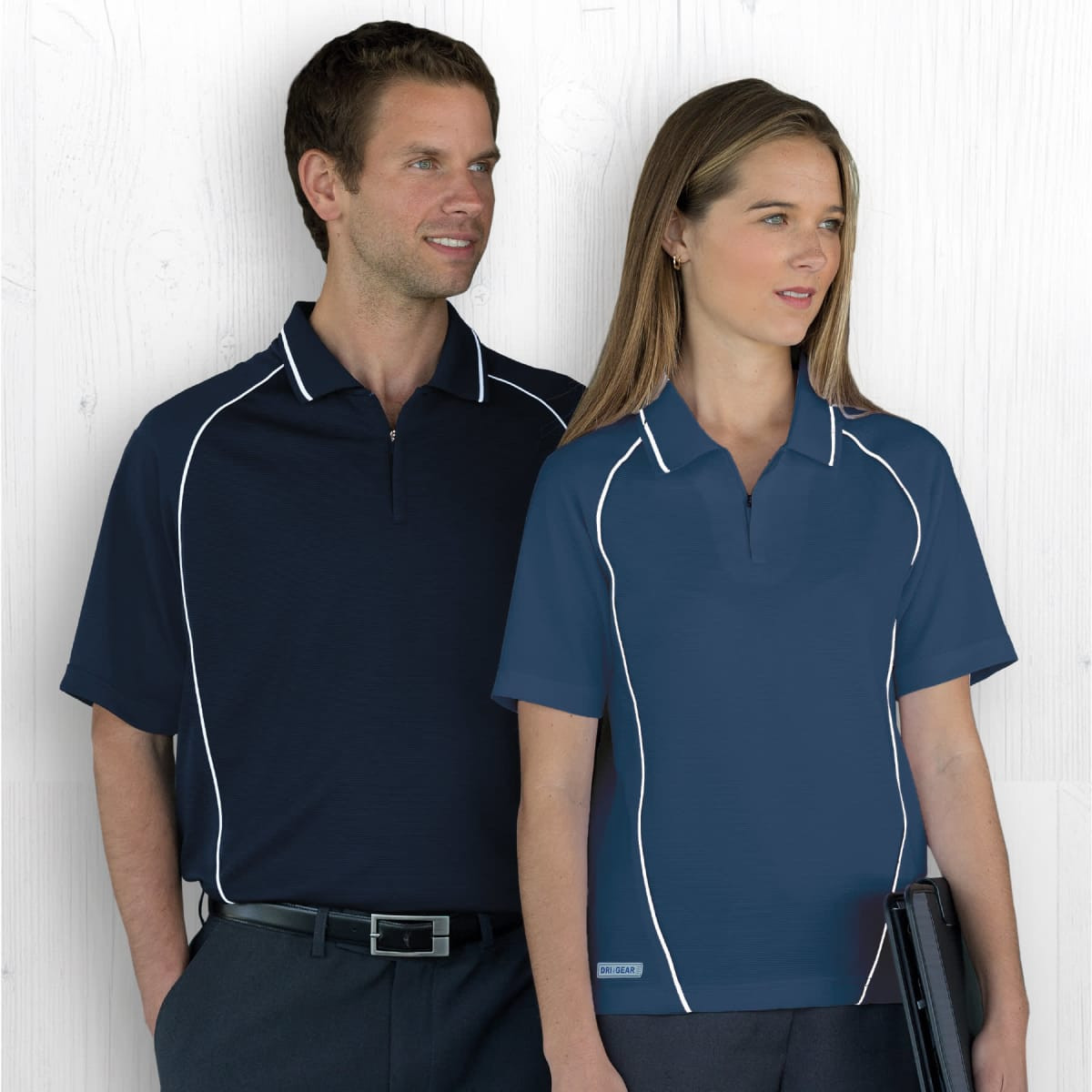 A navy polo shirt with white piping, displayed on a male and female model, featuring a logo.