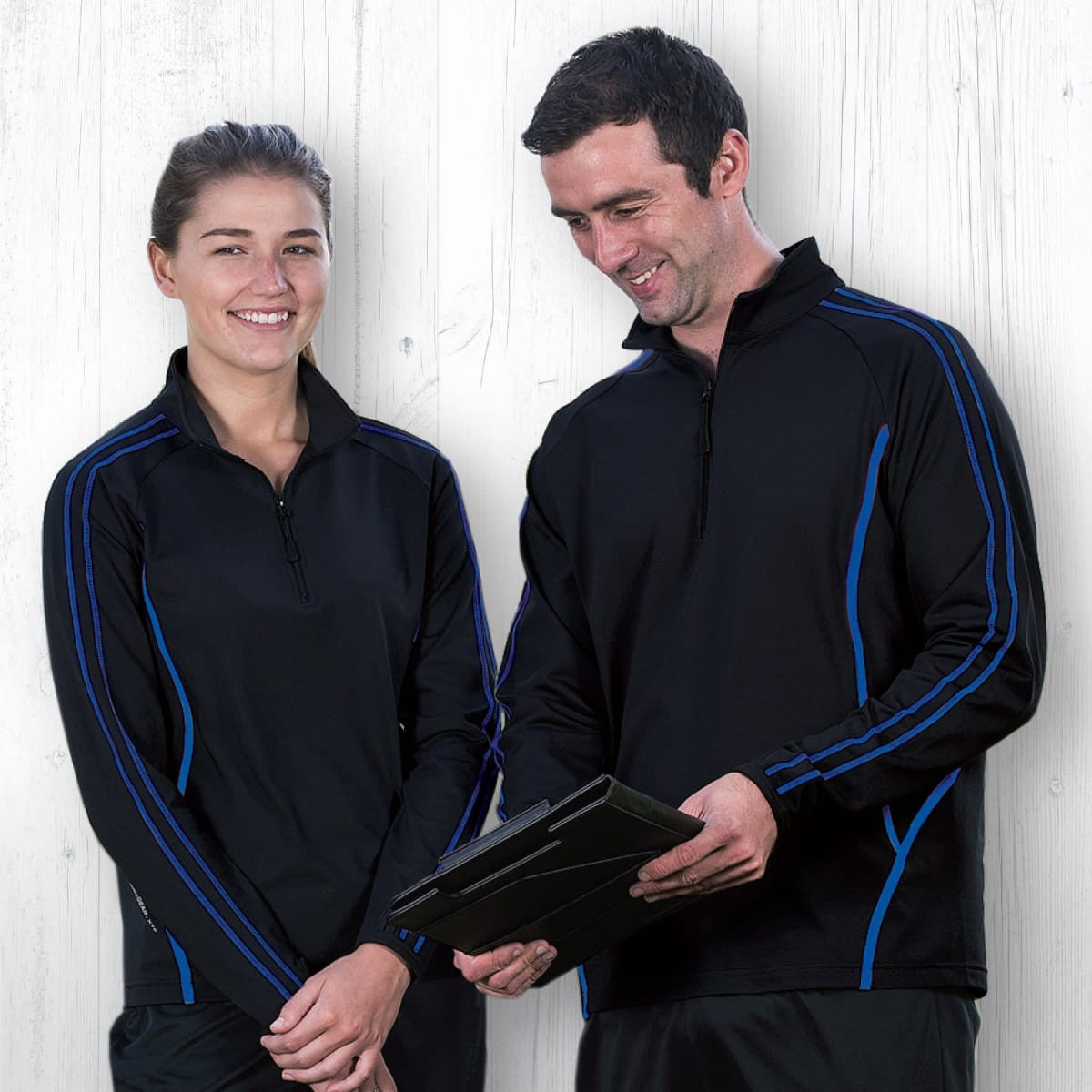 A black pullover with blue stripe accents, featuring a zipper collar, displayed by two models.