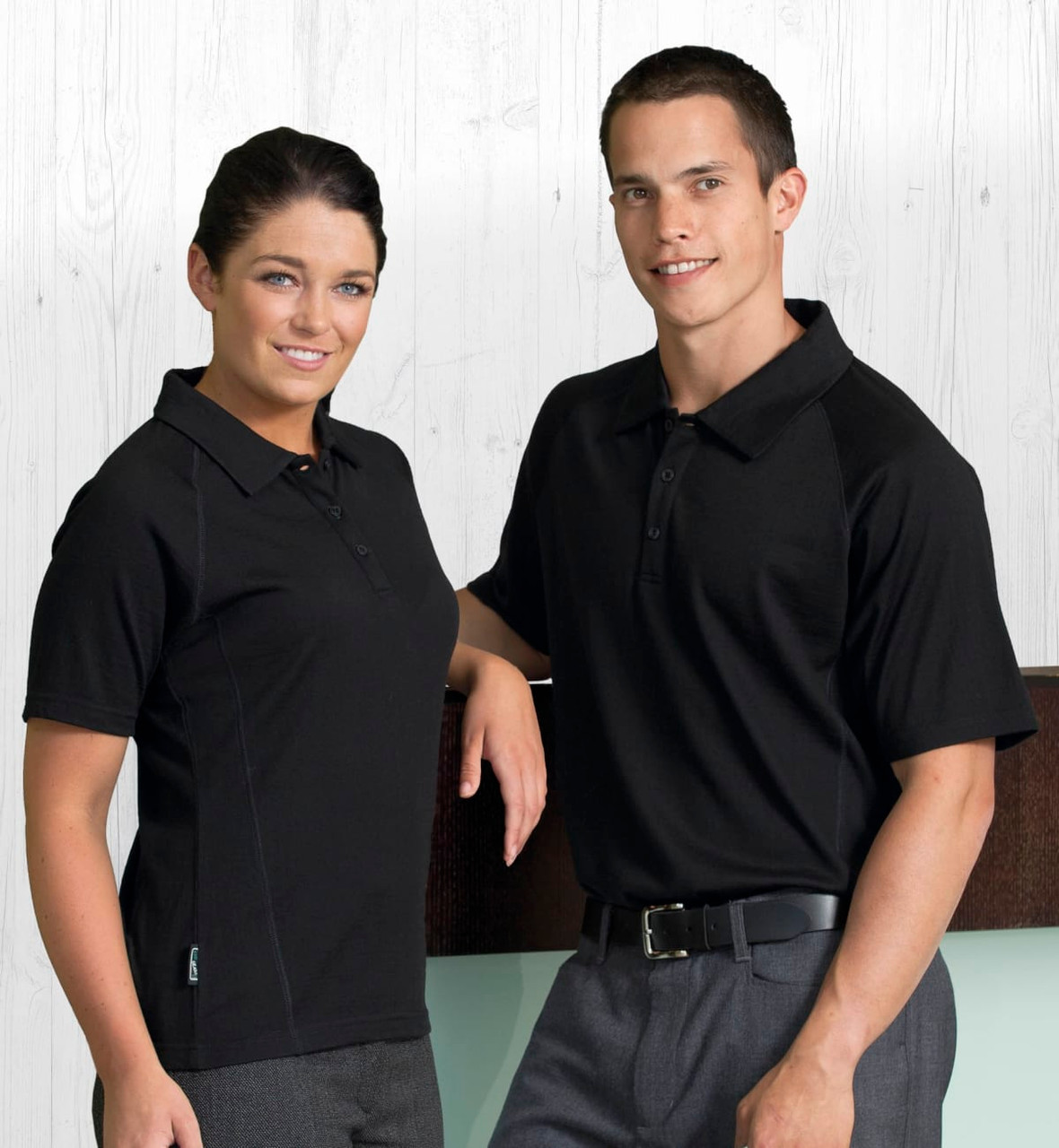 A black short sleeve polo shirt for men, featuring a logo, displayed on a male and female model.