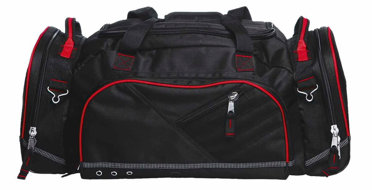 A black duffle bag with red accents and multiple compartments, featuring zippers and handles.
