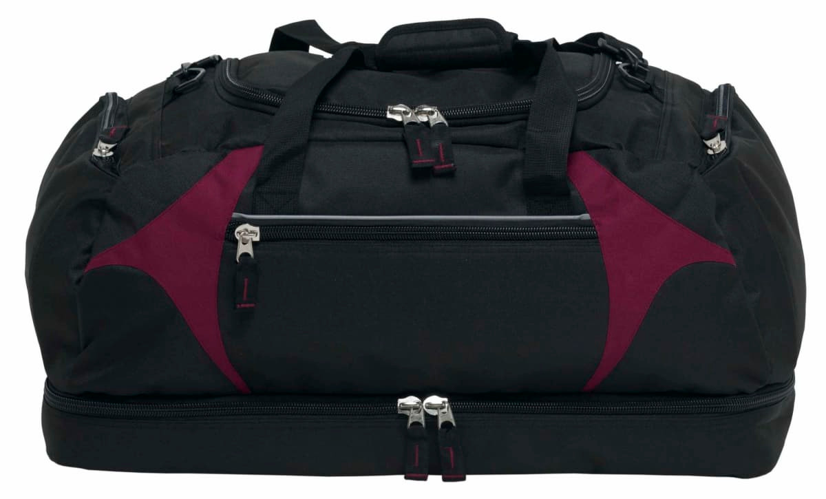 A large black duffle bag with maroon accents and multiple zippered compartments. It features handles and a logo.