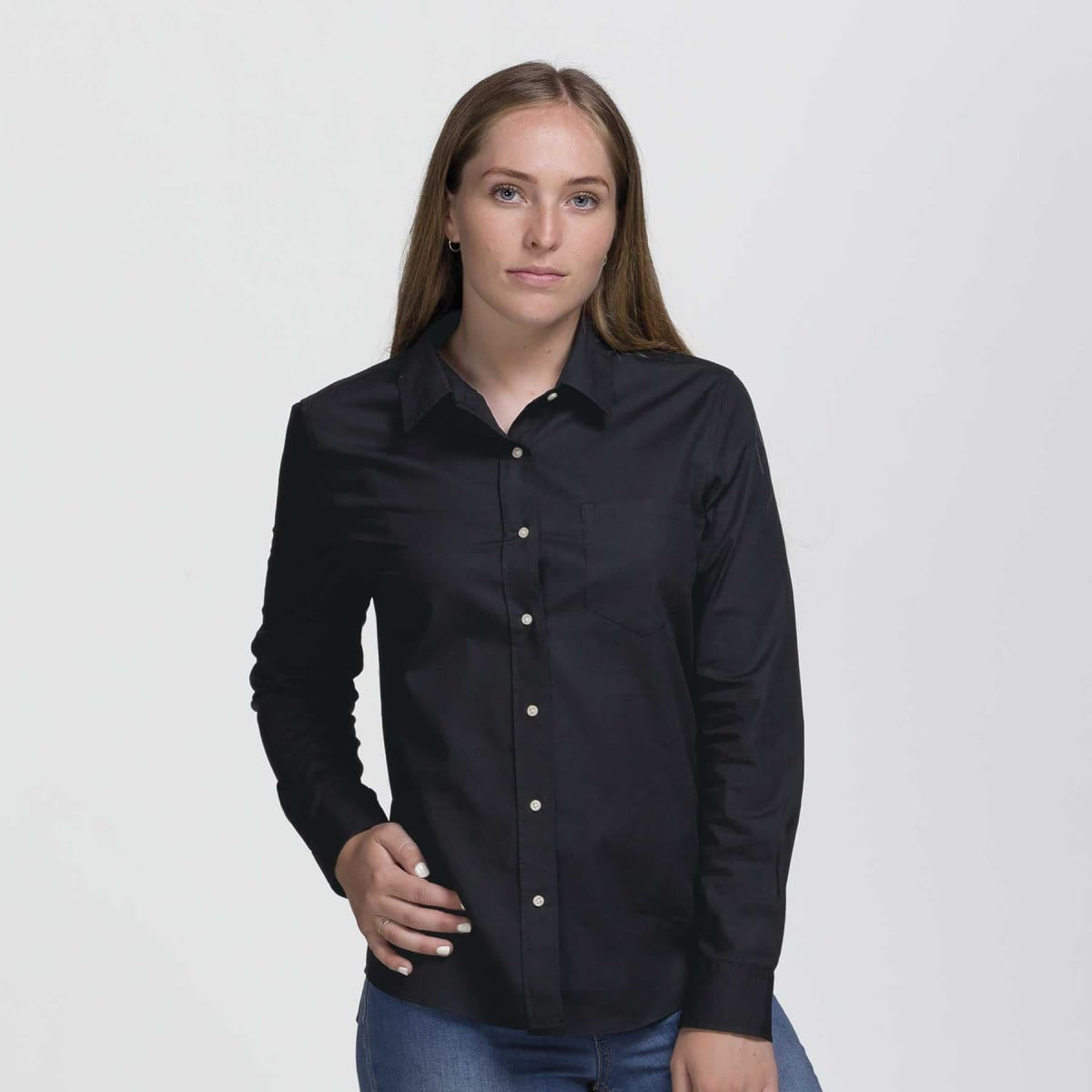 A black button-up shirt with long sleeves and a front pocket, featuring a logo on the front.