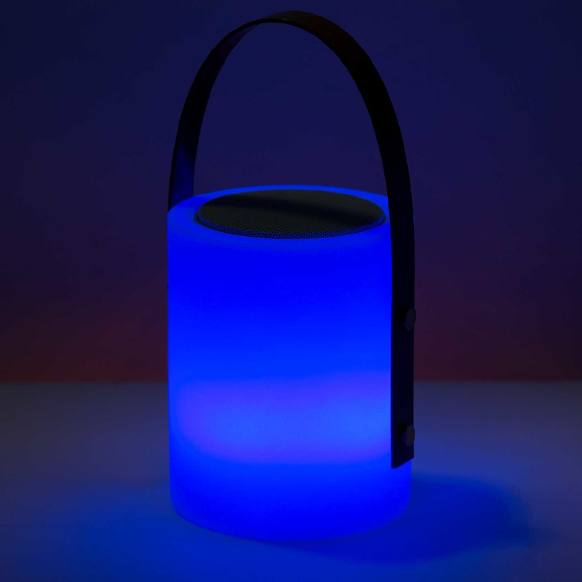 A blue lamp speaker with a handle, featuring a smooth cylindrical design and illuminated base.