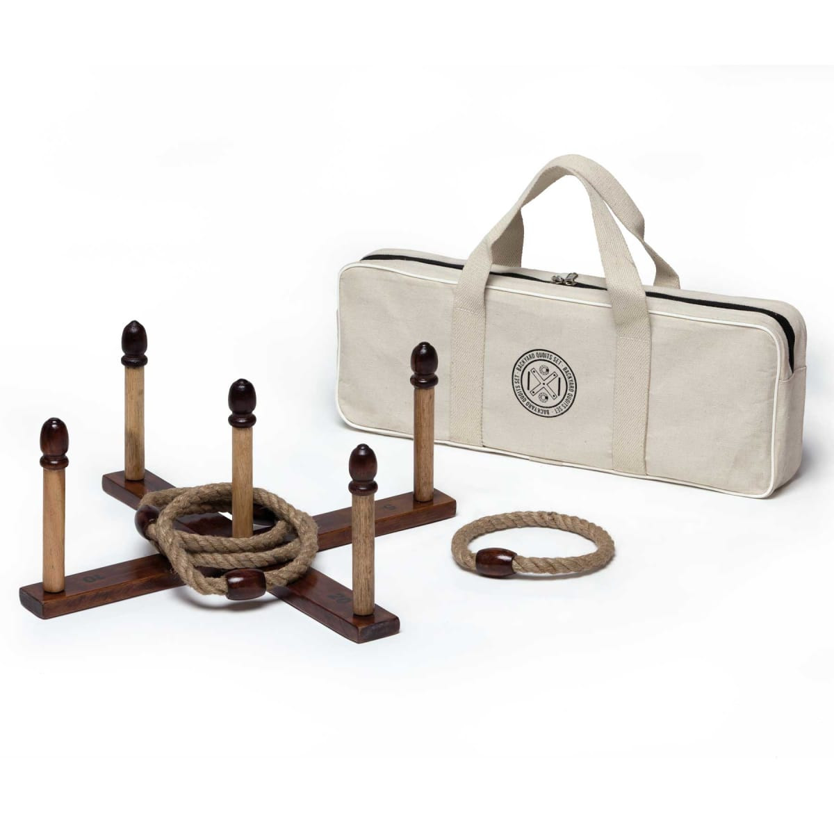 A Backyard Quoits Set featuring a wooden base with five posts, ropes, and a carrying bag. The bag is cream-coloured.
