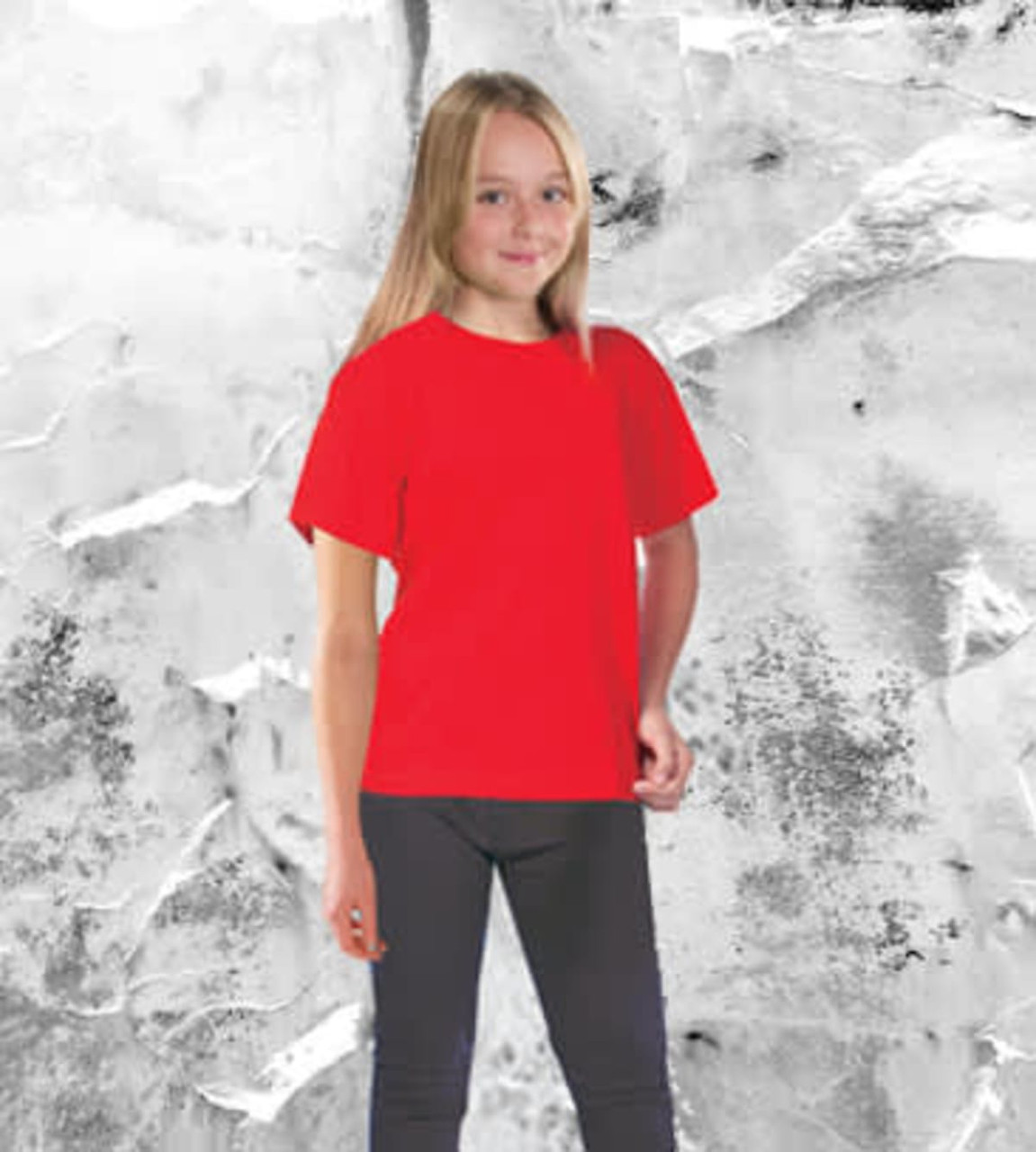 A red junior tee displayed on a child against a textured grey background, featuring a logo.