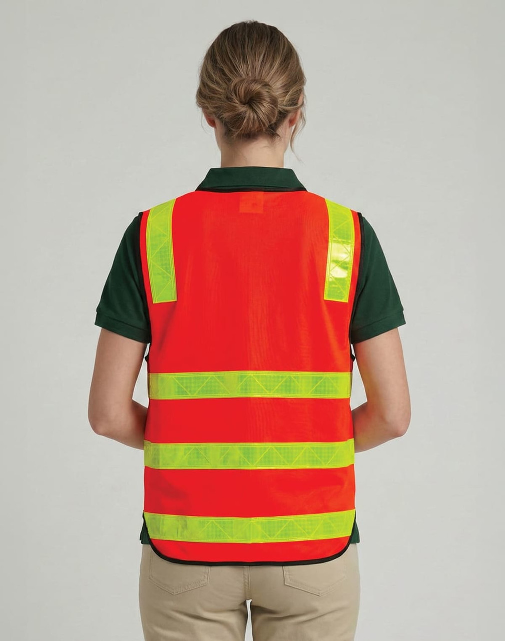 A high-visibility orange road safety vest with reflective yellow stripes, featuring a logo on the back.