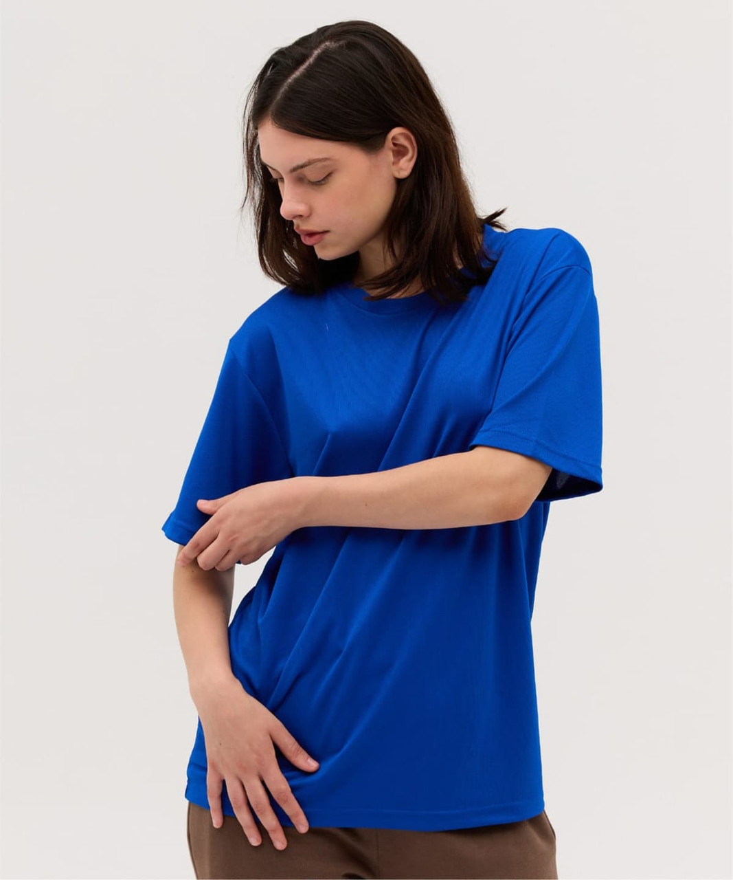 A blue t-shirt with a relaxed fit, featuring a simple design and no visible logos or branding.