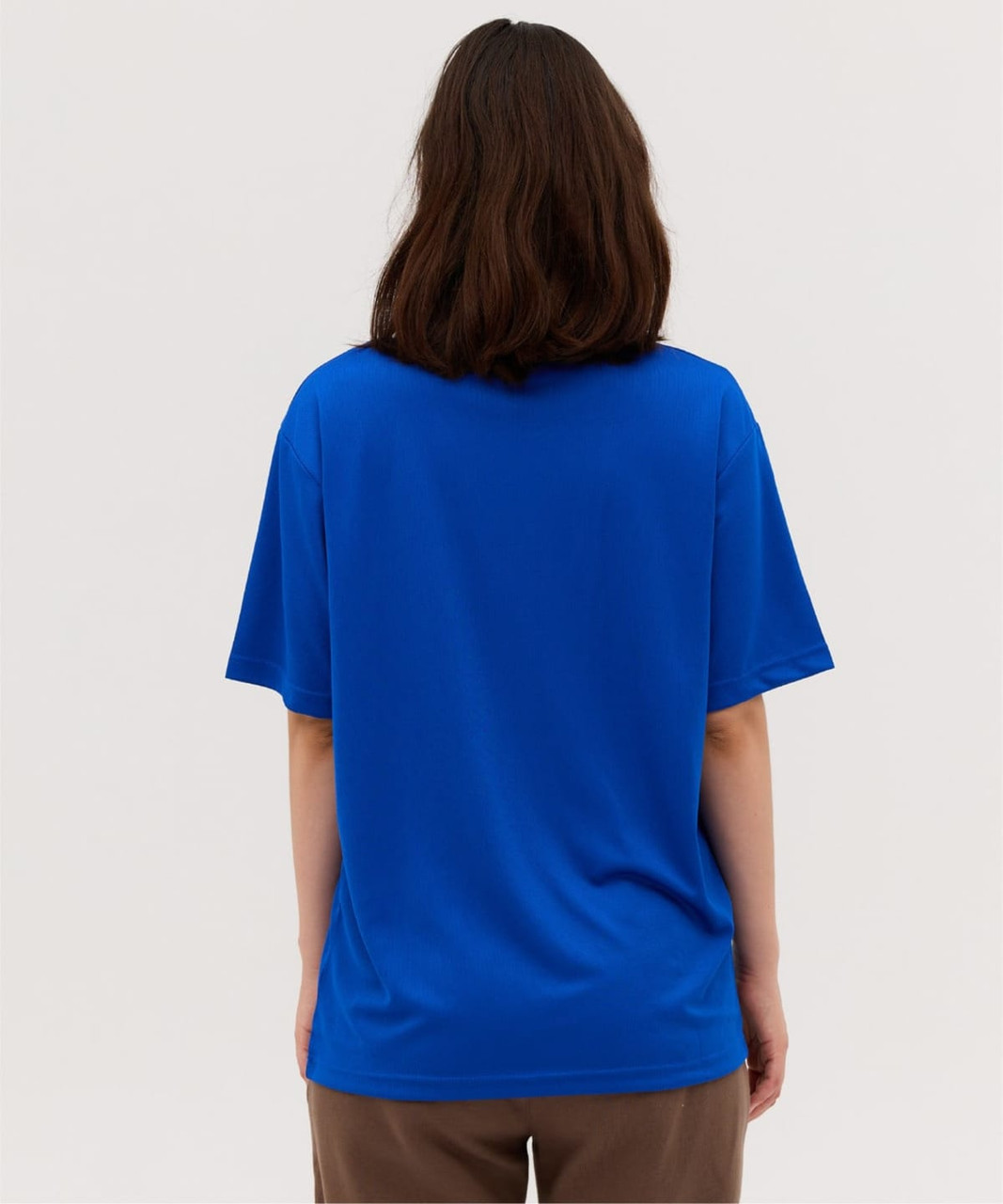 A blue t-shirt with a loose fit, featuring a simple design and a logo on the back.