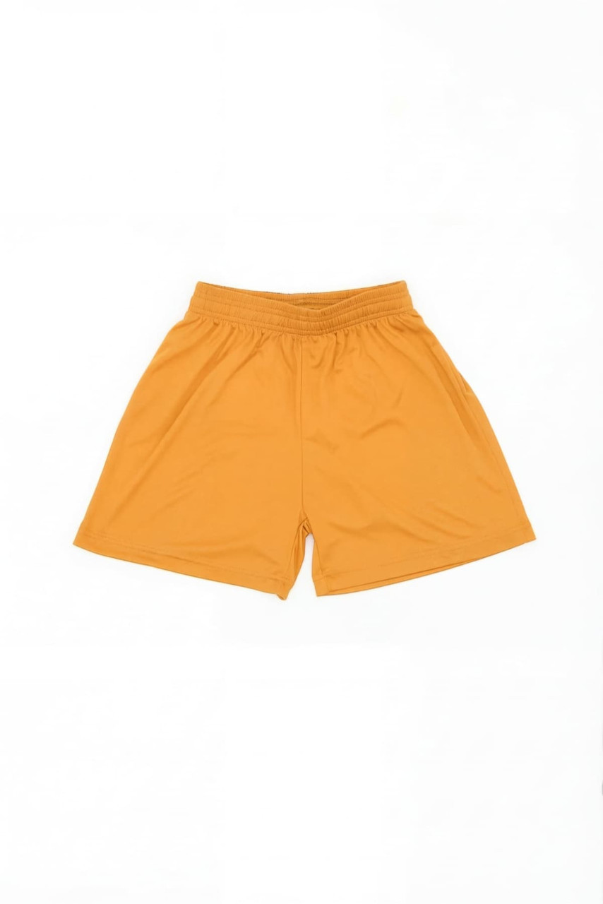 Youth Core Shorts in bright orange, featuring an elastic waistband and a simple design. It includes a logo.