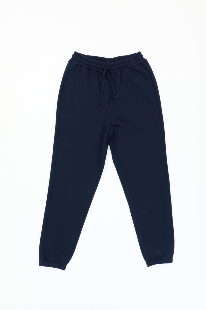 Navy track pants with a drawstring waist and cuffed ankles, featuring a logo near the waistband.