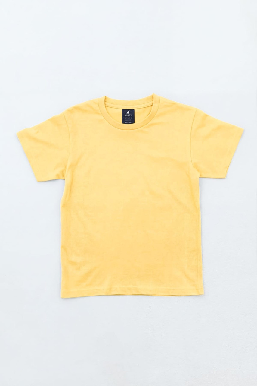 A yellow youth essential t-shirt displayed flat, featuring a branding label on the neckline.