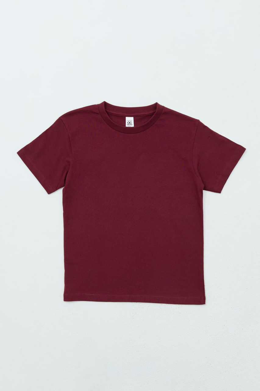 A maroon youth t-shirt displayed flat, featuring short sleeves and a plain design with a logo.