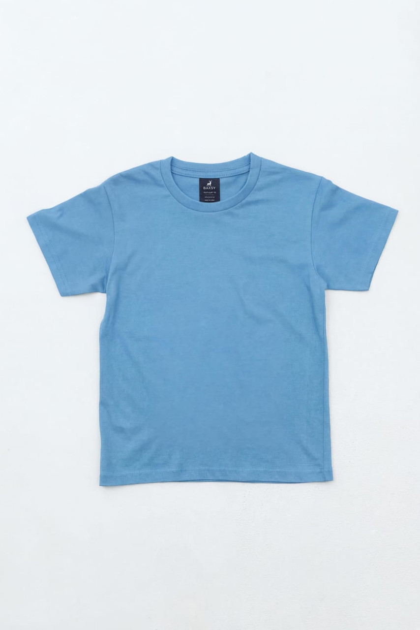A light blue youth t-shirt with short sleeves and a round neck. The shirt features a logo.