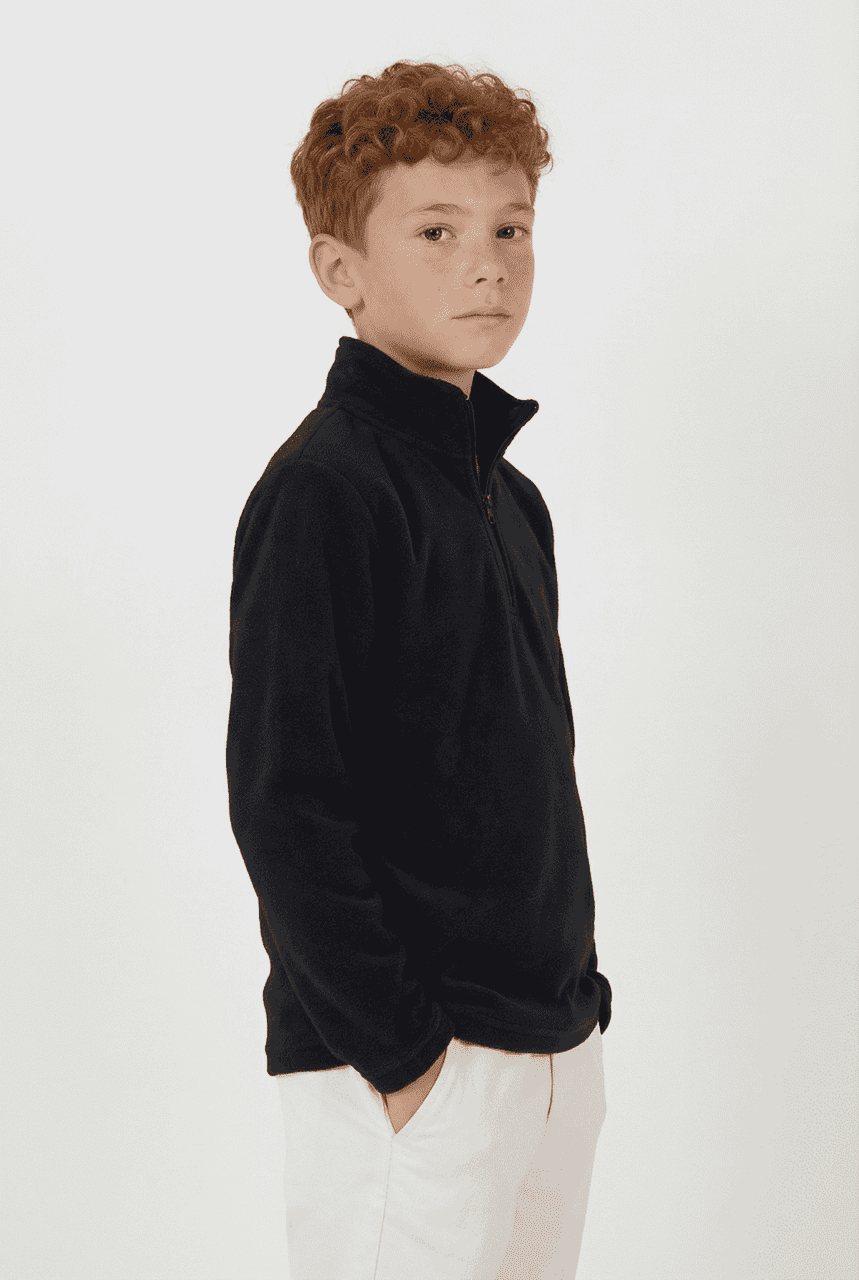 A youth black polar fleece 1/4 zip jacket, featuring a high collar and front zip, suitable for cooler weather.