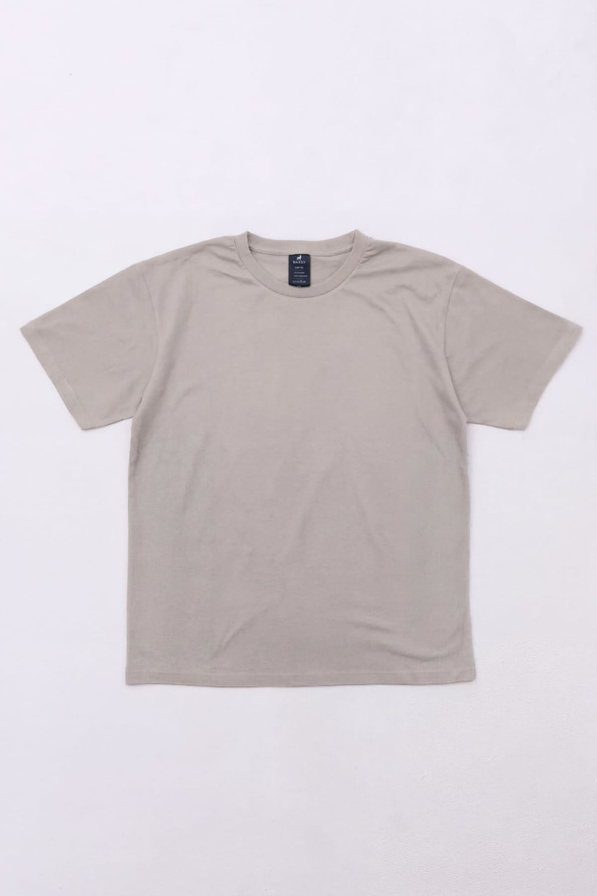 A light grey Essential Tee, featuring a simple design and short sleeves, with a logo on the neckline.