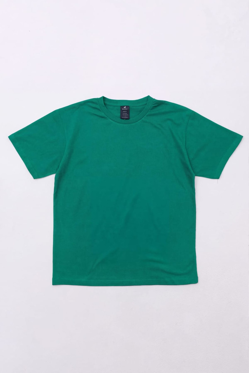 A green Essential Tee with a simple design and a logo at the neck. The T-shirt has short sleeves.