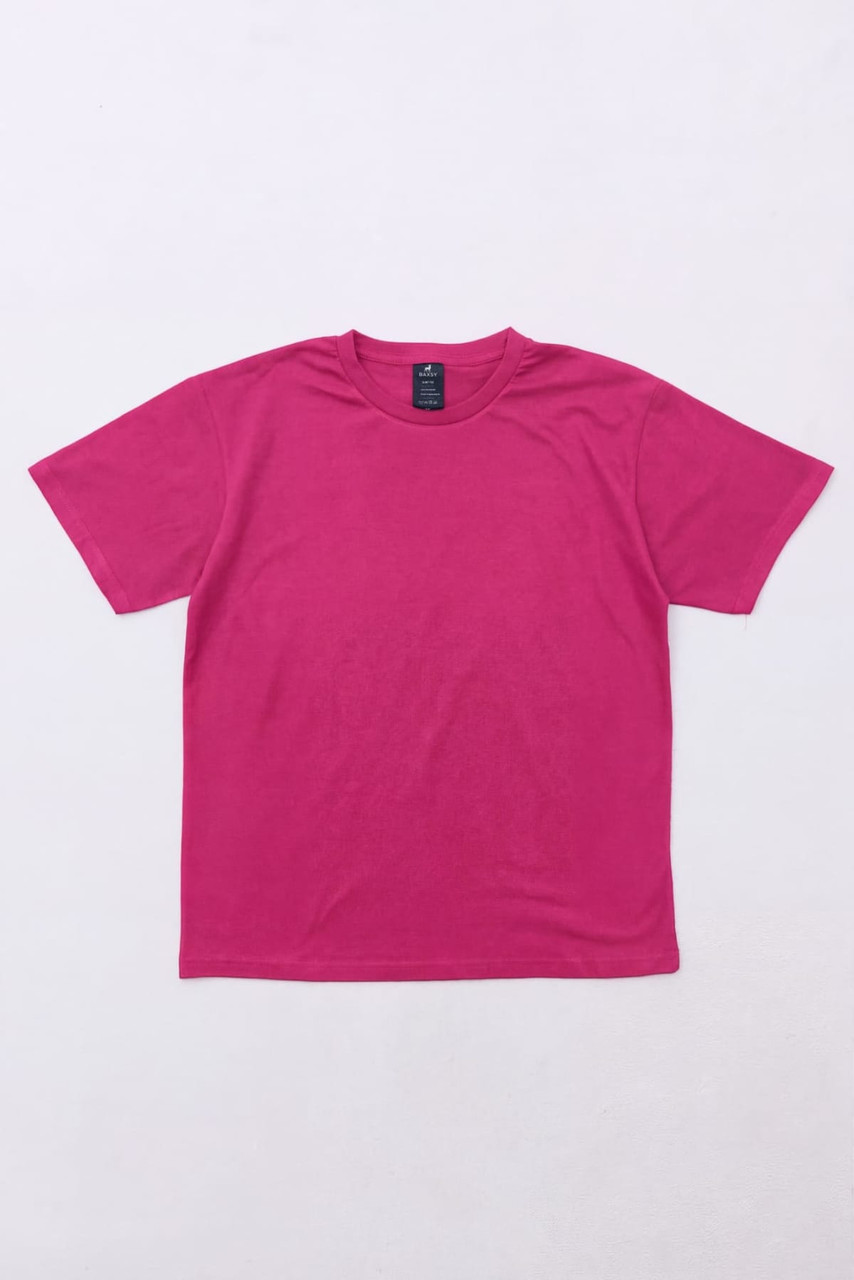 A pink Essential Tee shirt displayed flat, featuring a simple design and a logo on the label.