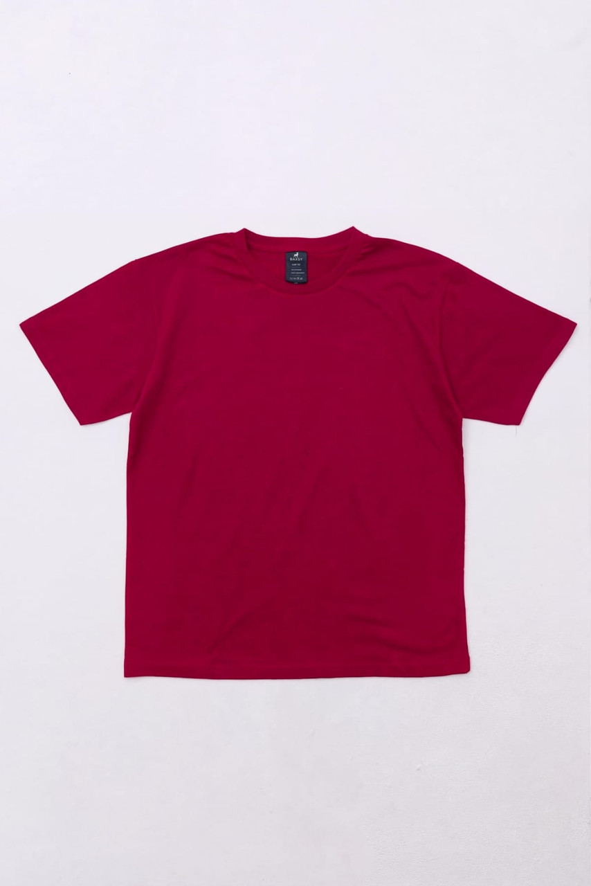 A red essential tee shirt flat on a white background, featuring a label but no visible logo or branding.