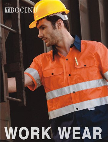 A man wearing an orange and navy hi-vis cotton drill shirt with reflective tape and a yellow hard hat.