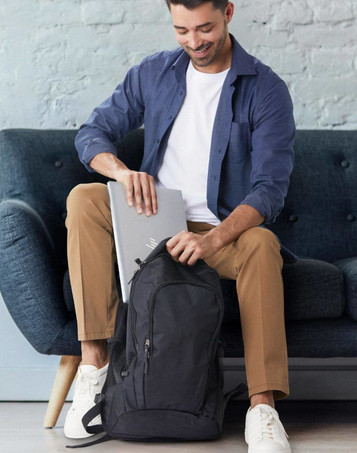 A black executive backpack featuring adjustable straps and mesh side pockets for storage.
