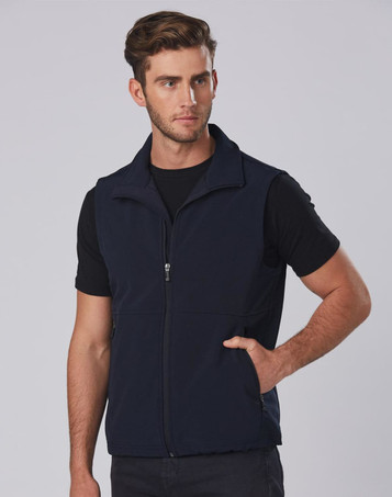 A men's softshell hi-tech vest in navy blue, featuring a zip front and side pockets, worn over a black t-shirt.