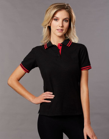 A black polo shirt with red collar and sleeve stripes, featuring a logo on the chest.
