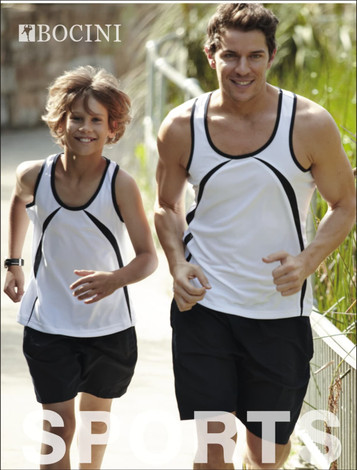 A man and a boy are jogging outdoors, wearing matching white and black athletic tank tops with shorts.