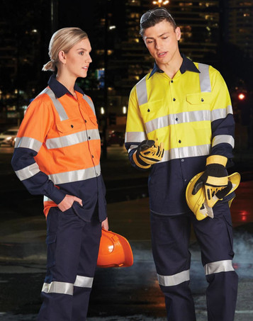 Two workers wearing two-tone safety shirts in orange and yellow, featuring reflective tape, with hard hats and gloves.