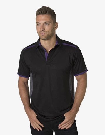 A black polo shirt with purple accents and a logo on the chest, modelled by a man.