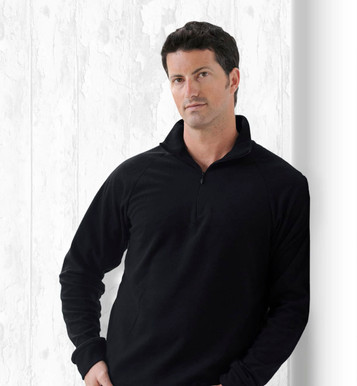 A black jumper with a zip collar, featuring a model standing against a textured white background.