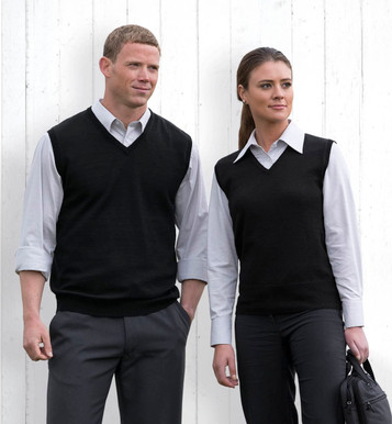 A black Merino fully fashioned vest for women displayed on a model, paired with a white shirt and black trousers.