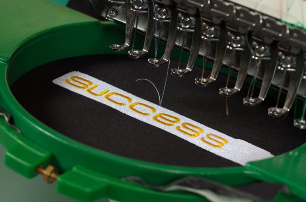 Embroidered logo stitched into a garment