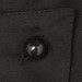 A close-up of a black button on dark fabric, part of a clothing accessory. Features visible stitching and texture.