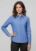 A women's long sleeve chambray button-up shirt in a light blue colour, featuring a collar and a single chest pocket.