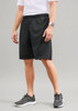 Black men's sports shorts with an elastic waistband and a logo, displayed on a model in a neutral background.