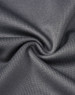 A close-up view of dark grey sustainable poly/cotton fabric, showcasing its smooth texture and stretchability.
