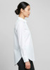 A long-sleeve white button-up shirt with a straight cut and side splits, featuring a logo on the label.
