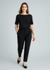 A black pair of women's slacks featuring a comfortable waistband and a matching black top, suited for casual wear.