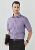 A short sleeve, button-up shirt in purple check pattern, paired with black trousers. Features a logo.