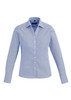 A light blue women's button-up shirt with long sleeves and a collared neckline, featuring a logo.