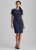 A fitted navy short sleeve shift dress on a model, featuring a classic round neckline and a sleek design.