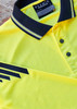 A yellow long sleeve polo featuring black stripes and a collar, with a brand label on the inside.