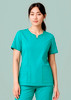 A teal women's scrub top with a round neck and short sleeves, featuring two front pockets. It has a logo on the fabric.