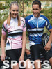 Sports shorts in black, featuring a fitted design. Accompanied by a logo, showcased with matching cycling jerseys in pink and blue.