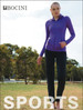 A purple ladies yoga jacket with a hood and front pockets, styled with black pants. Features a logo.