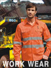 A bright orange long-sleeve work shirt with reflective tape, featuring a front pocket and a logo.