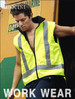 A Hi-Vis yellow reversible vest with reflective tape, featuring a black collar and a sleek design.