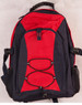 A red and navy Smartpack Backpack featuring adjustable straps and a front bungee cord. It includes side mesh pockets and a logo.