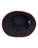 A black bucket hat with a red contrast brim and interior. The hat features a label inside.