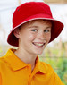 A red bucket hat featuring contrast trim, worn by a smiling young boy in an orange shirt, with a logo present.